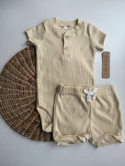 Conunto body amarillo + short — vista principal